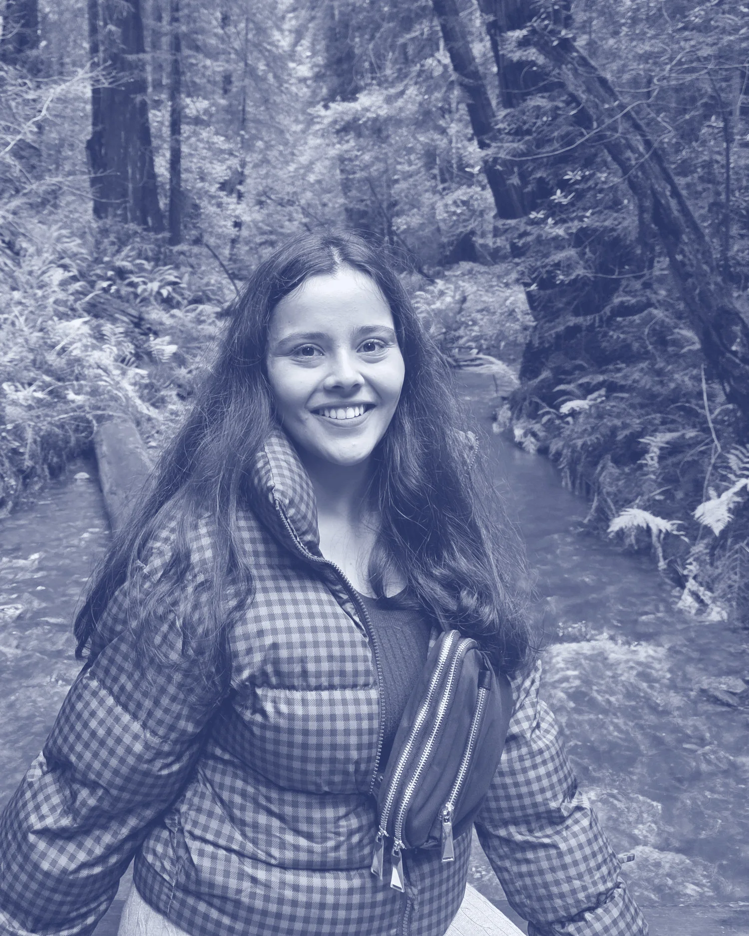 Soumya Sharma, photographed on a footbridge in a redwood creek